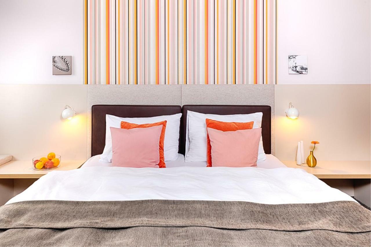 Concept Living Munich Serviced Apartments — Fotos 1